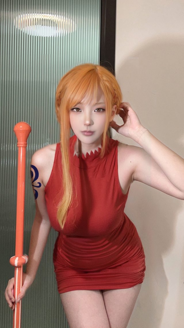 老虎尾巴呢《海贼王》娜美COS:再现“小贼猫”的性感魅力! 老虎尾巴呢《海贼王》娜美COS:再现“小贼猫”的性感魅力!